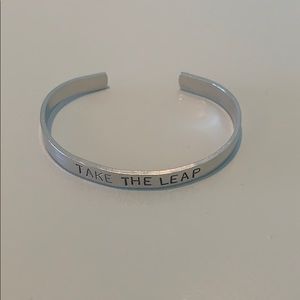 Silver “take the leap” bangle